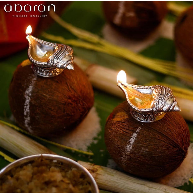 Silver conch shaped diya (Pair)