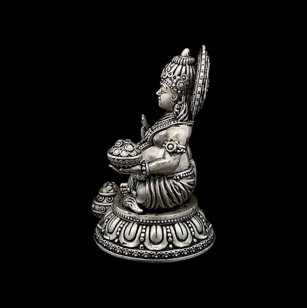 Antique finish silver Kubera idol - Medium