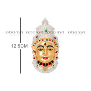 Silver Varalakshmi face in gold polish decorated with stones