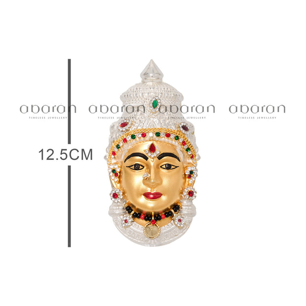 Silver Varalakshmi face in gold polish decorated with stones