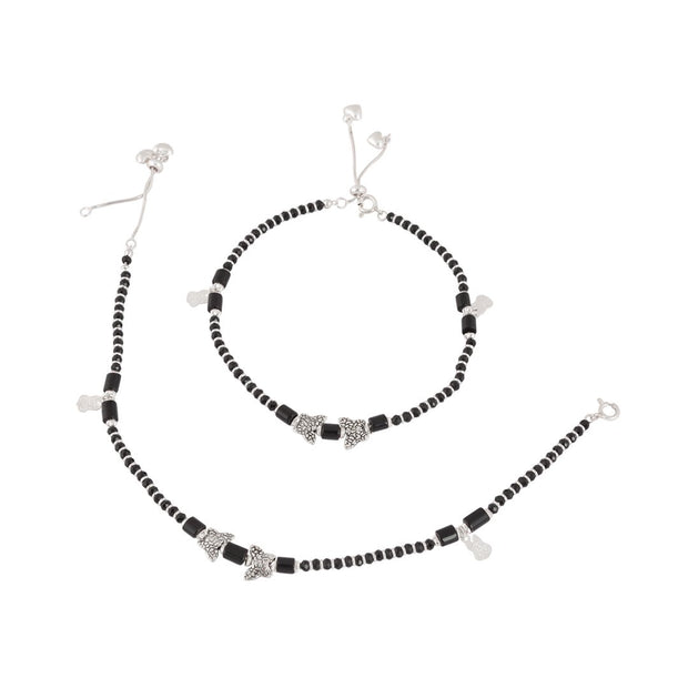 Black-beaded silver charms anklet